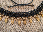 The Caviar Featherdrop Necklace