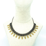 The Caviar Featherdrop Necklace